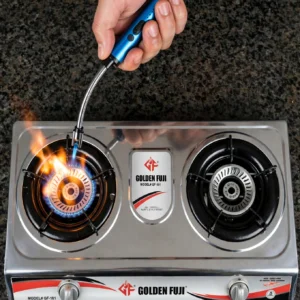 Long neck electric arc lighter being used to ignite a compatible kitchen gas stove